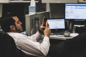 Man bored at work in the office