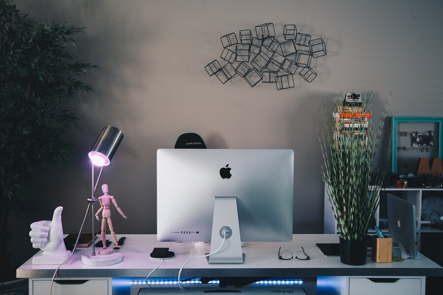 office desk with thumbs up trophy